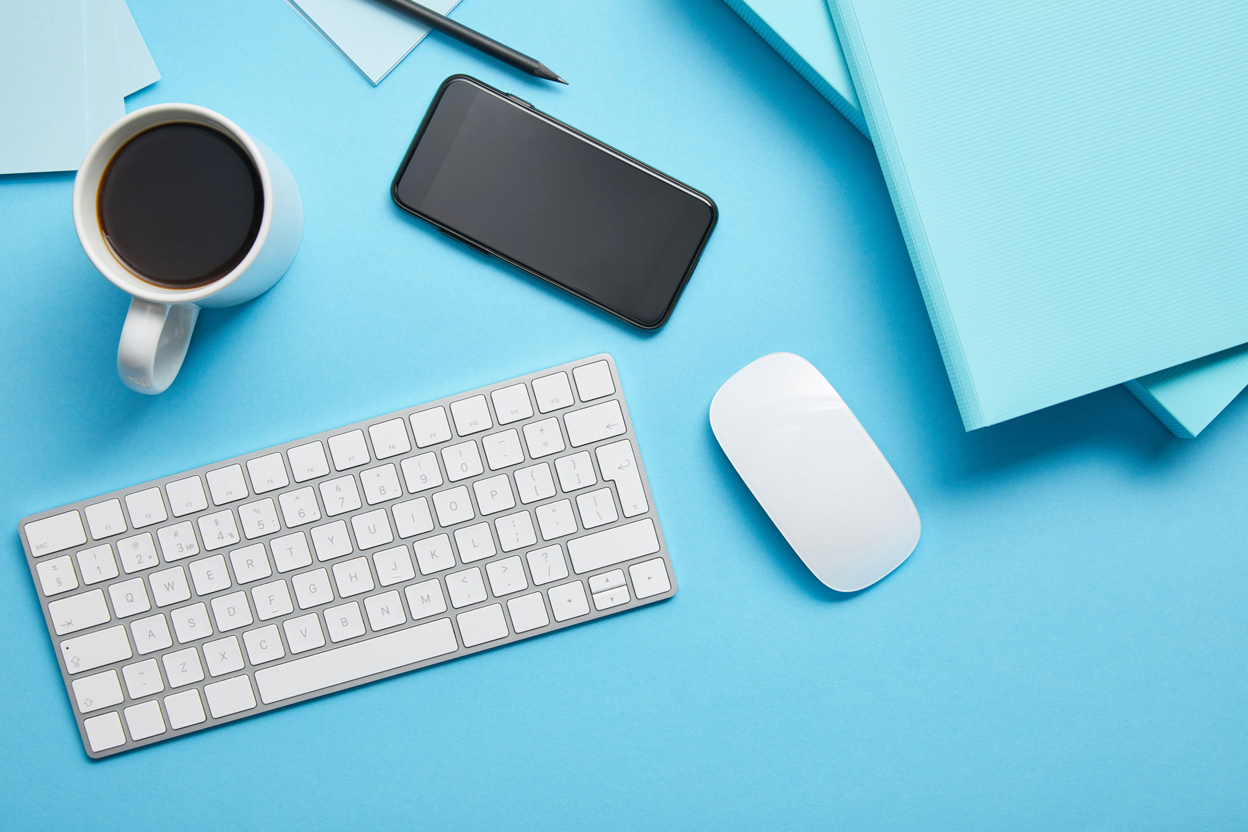 top-view-of-workspace-with-digital-devices-papers-2022-06-03-20-11-30-utc.jpg